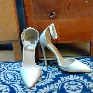 A Pair of Strap Stilettos